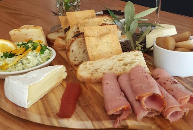 Win a platter and a bottle of wine at Two Sisters Food and Wine!