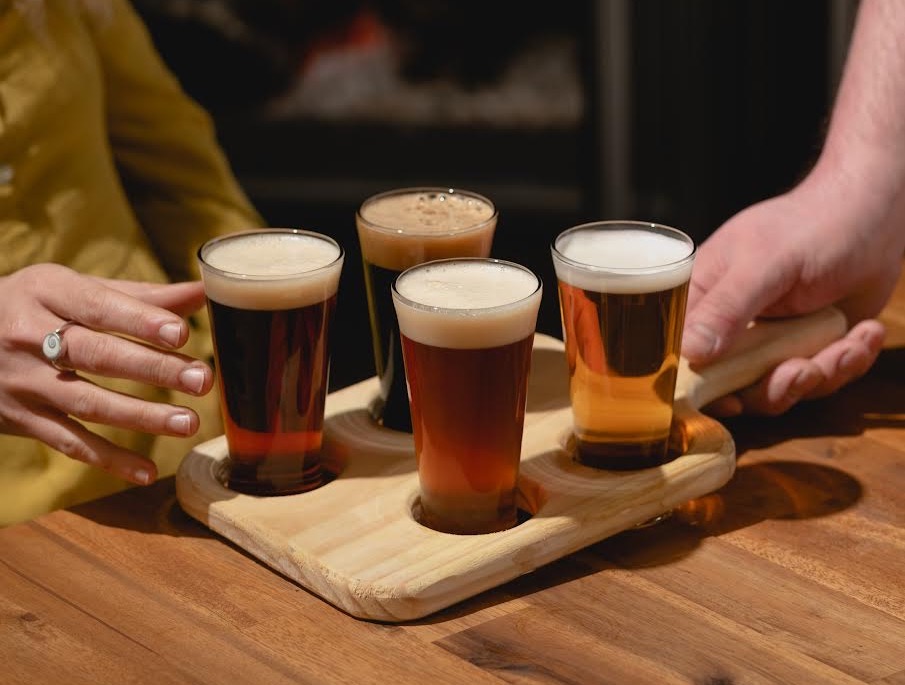 WIN 6 tasting paddles at SixTwelve Brewing thanks to Century 21 First Choice Rentals!