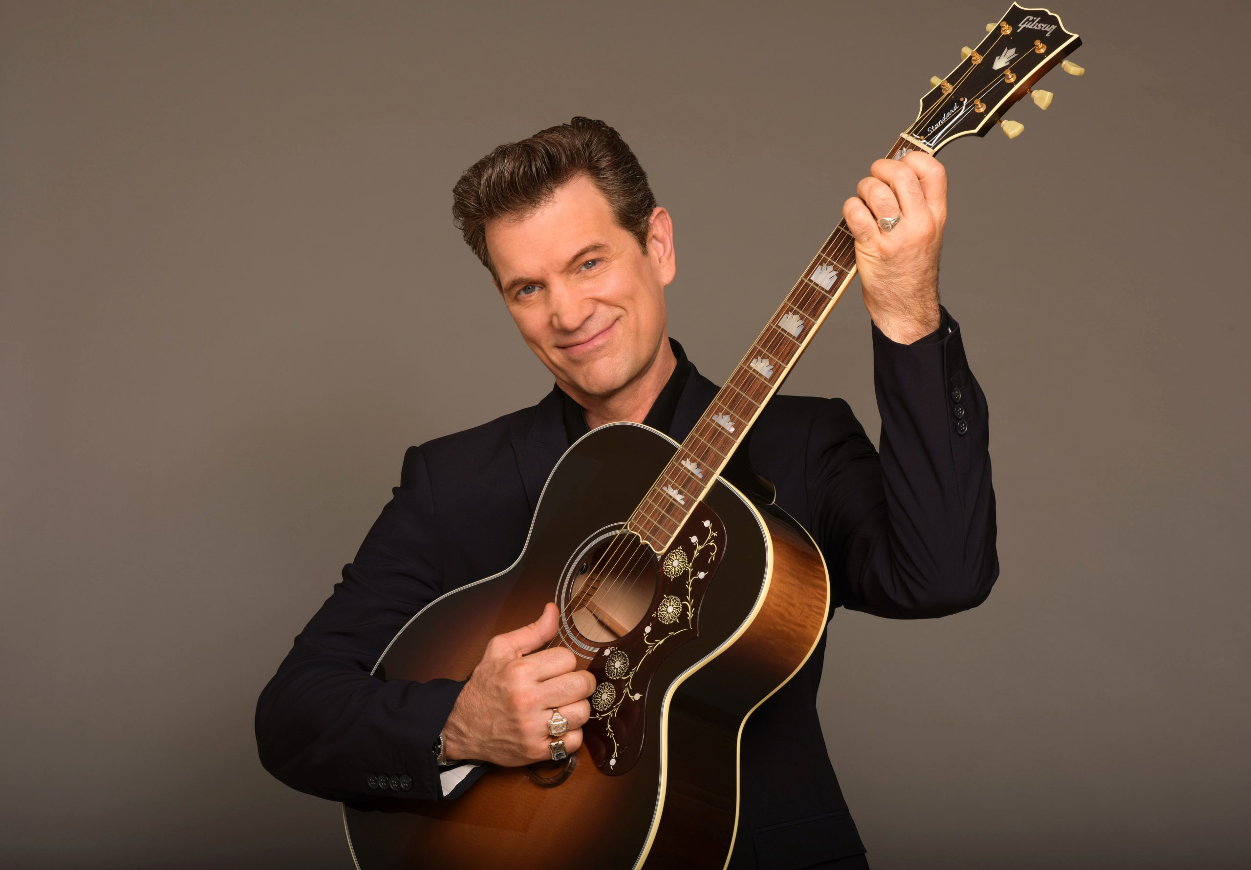 WIN 1 of 2 Double Passes to Chris Isaak in Concert at A Day on The Green!